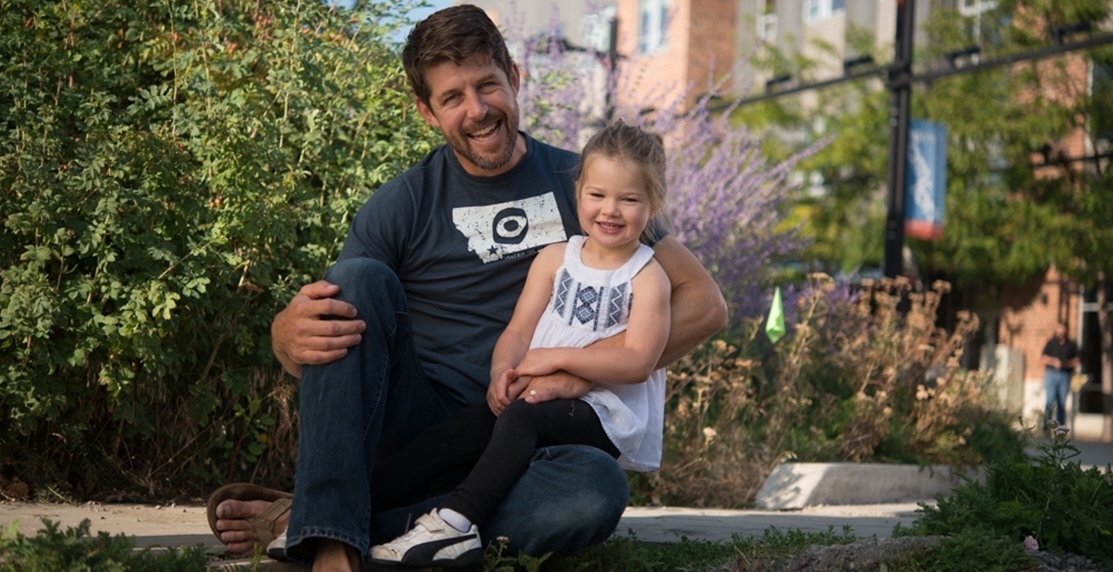 Smiling father and daughter