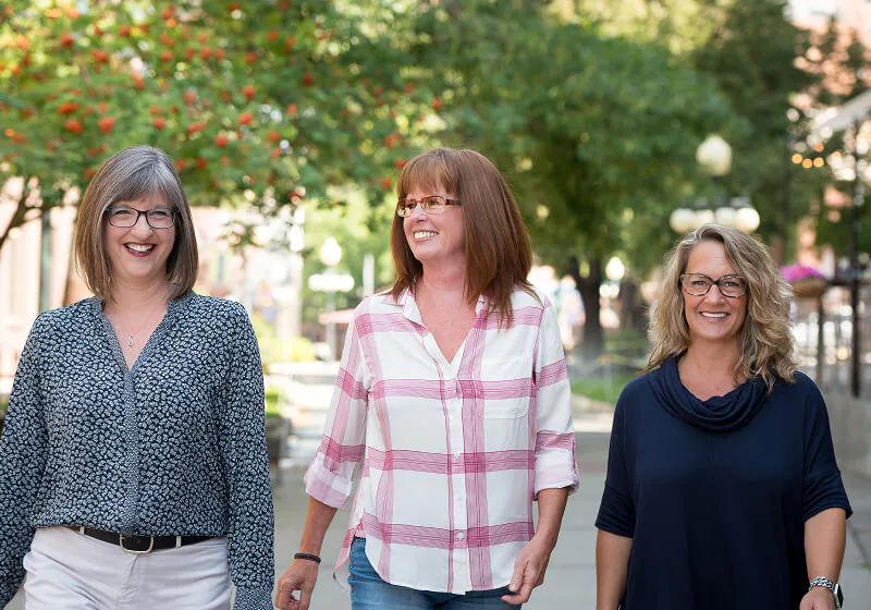 women smiling after visiting Great Divide Dental